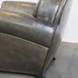 Sheepskin design armchair in a beautiful deep dark color