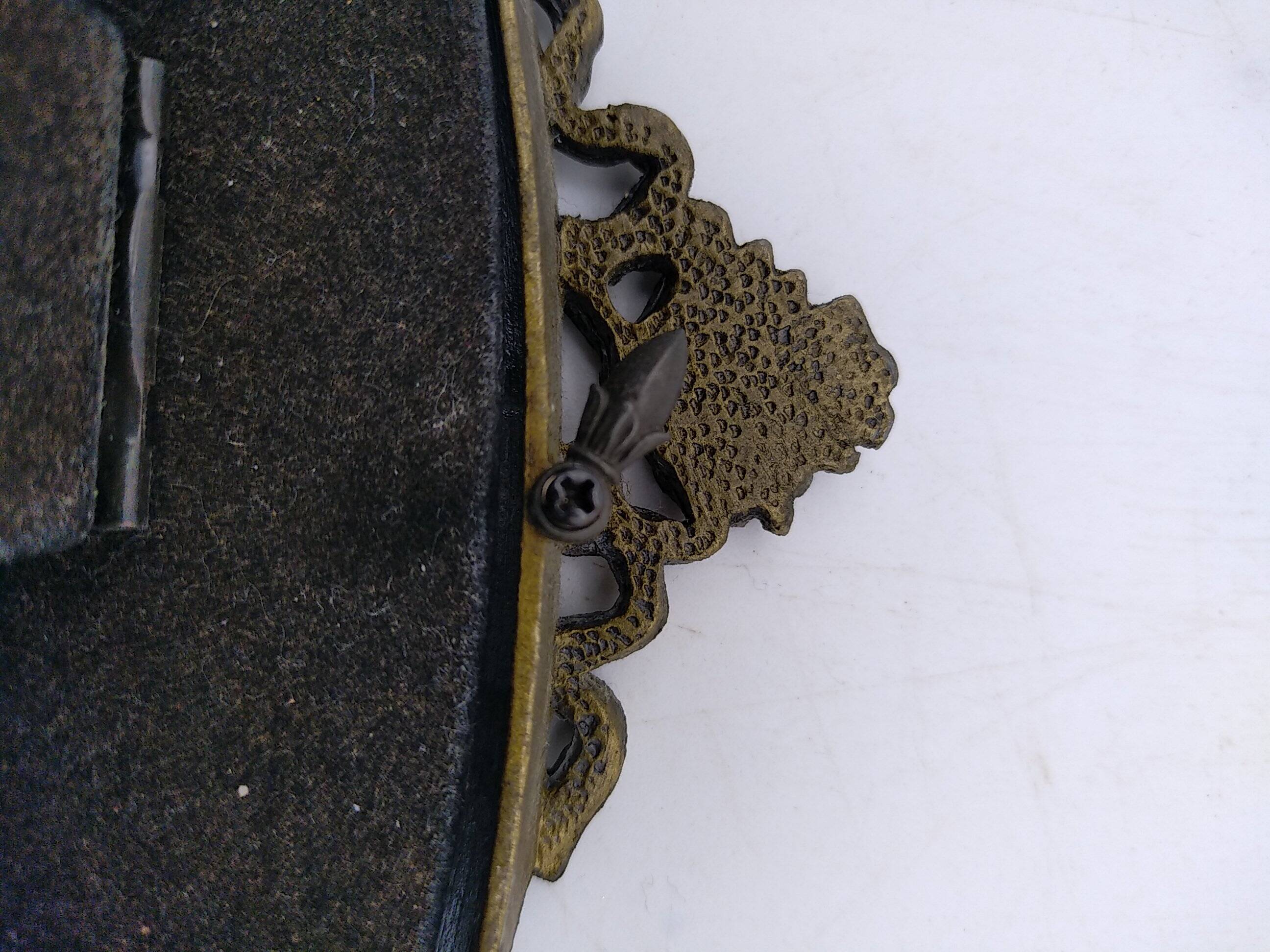 Oval brass photo frame circa 1900.