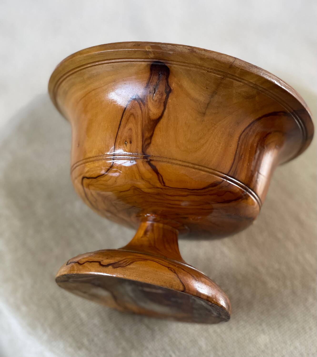 Empty pocket in olive wood