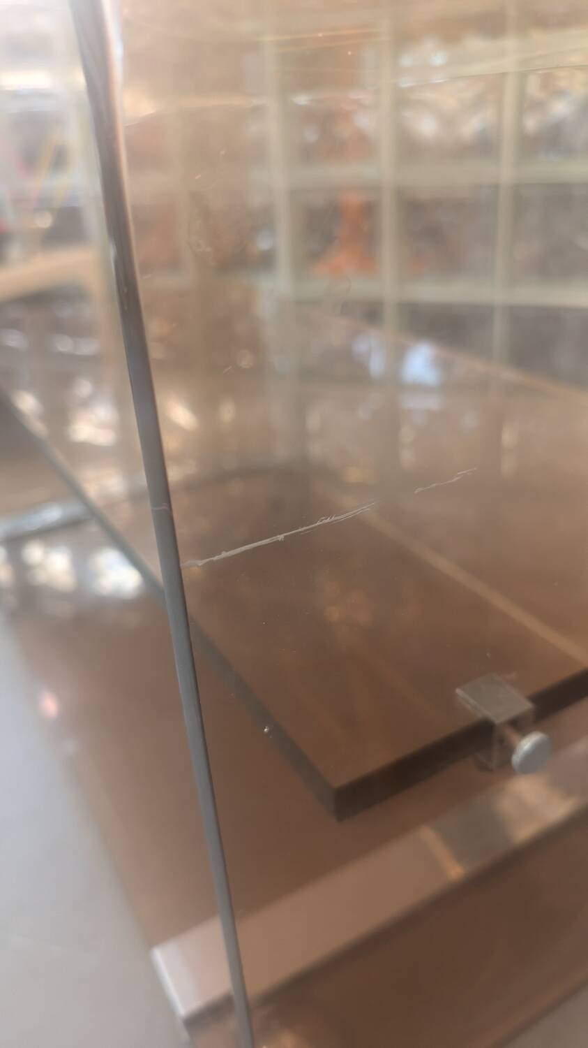 Smoked plexiglass coffee table