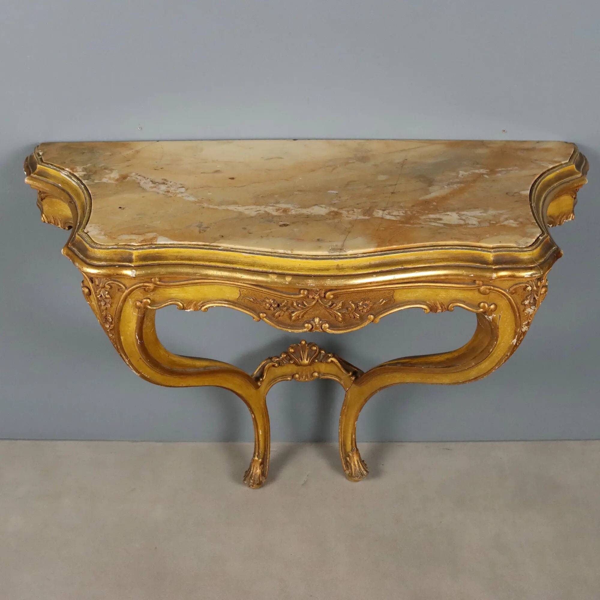 Antique console in carved gilded wood and marble, Italy, 19th century.