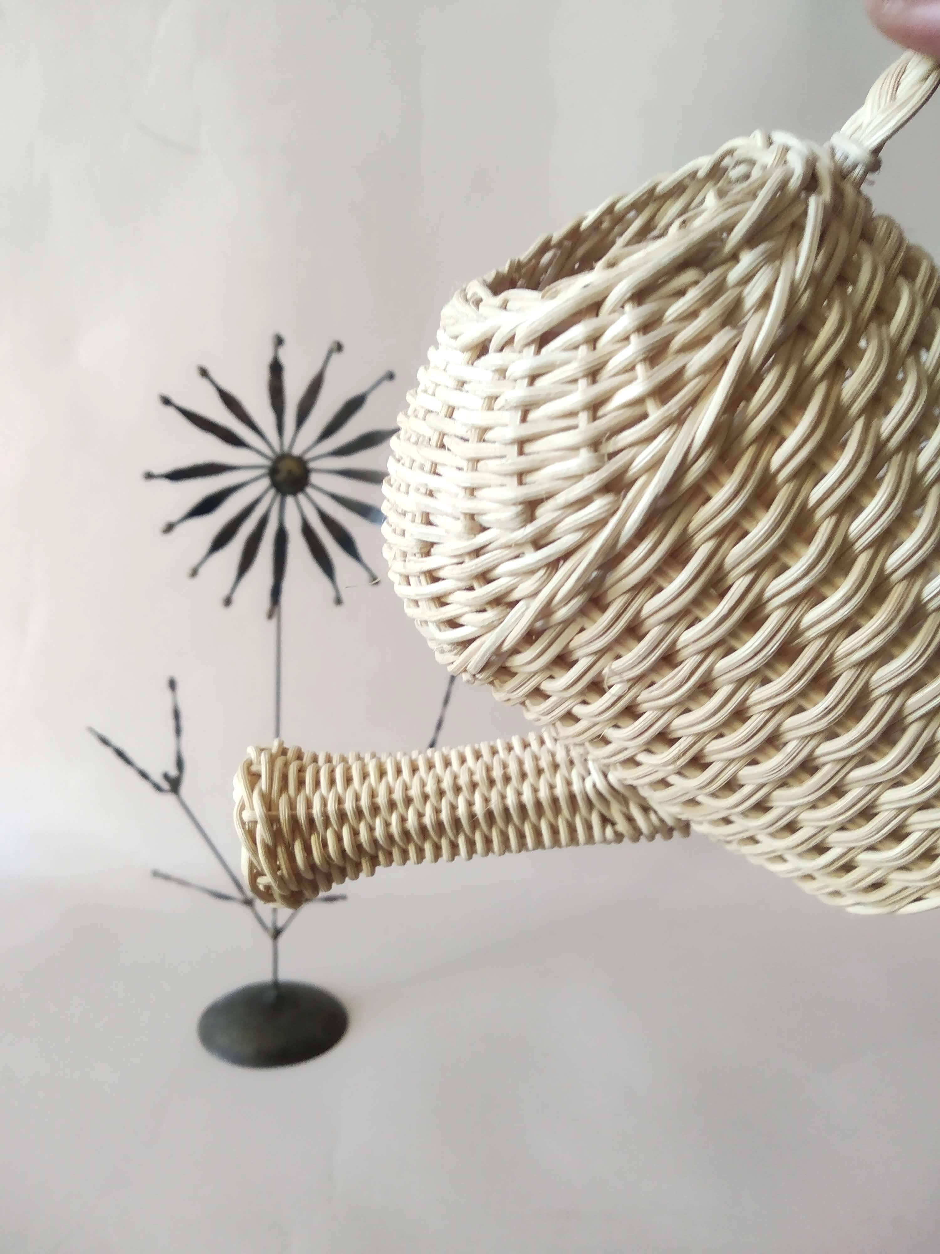 Miniature rattan watering can