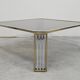 Large modernist coffee table attributed to Romeo Rega in steel and brass plating.