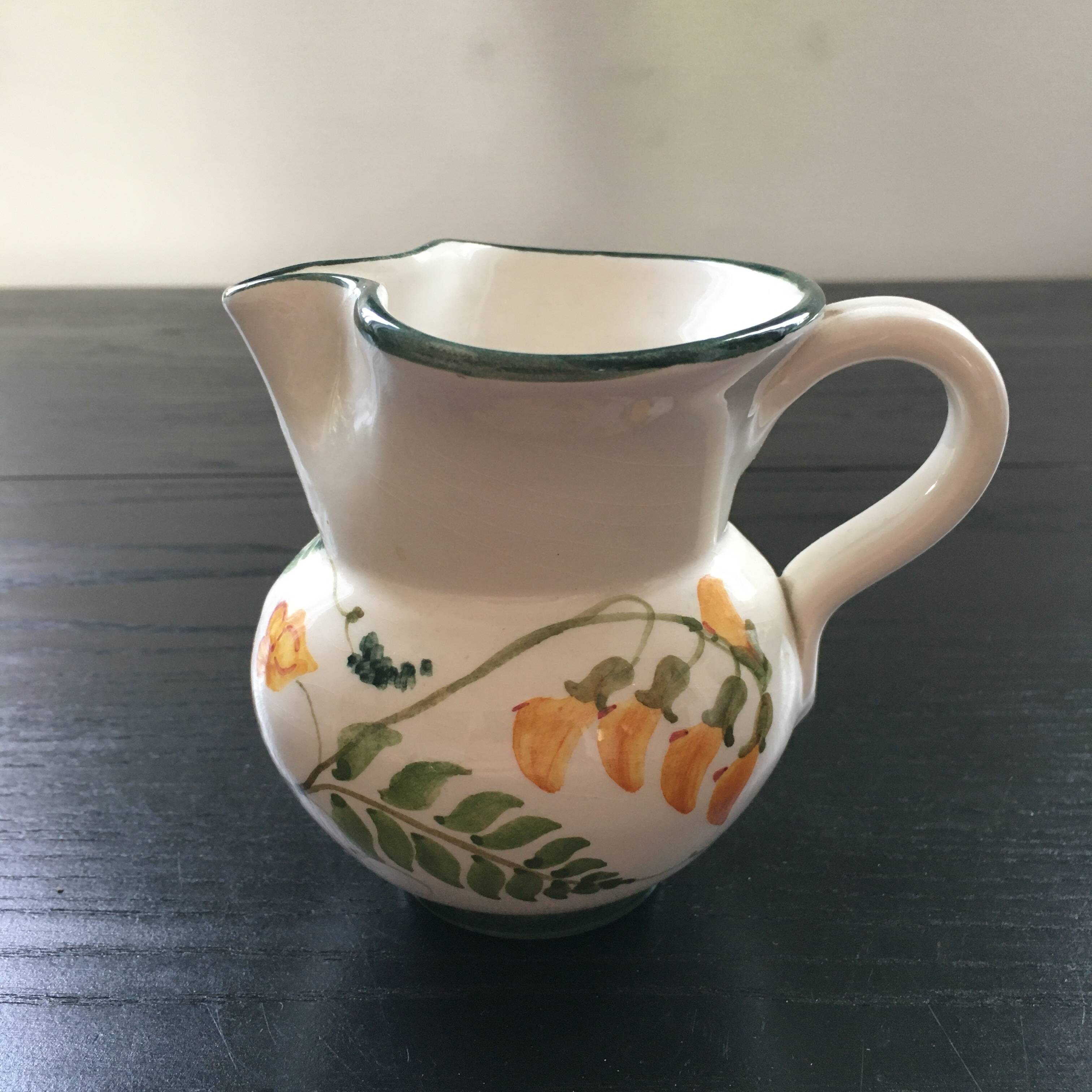 Small pitcher with floral decoration