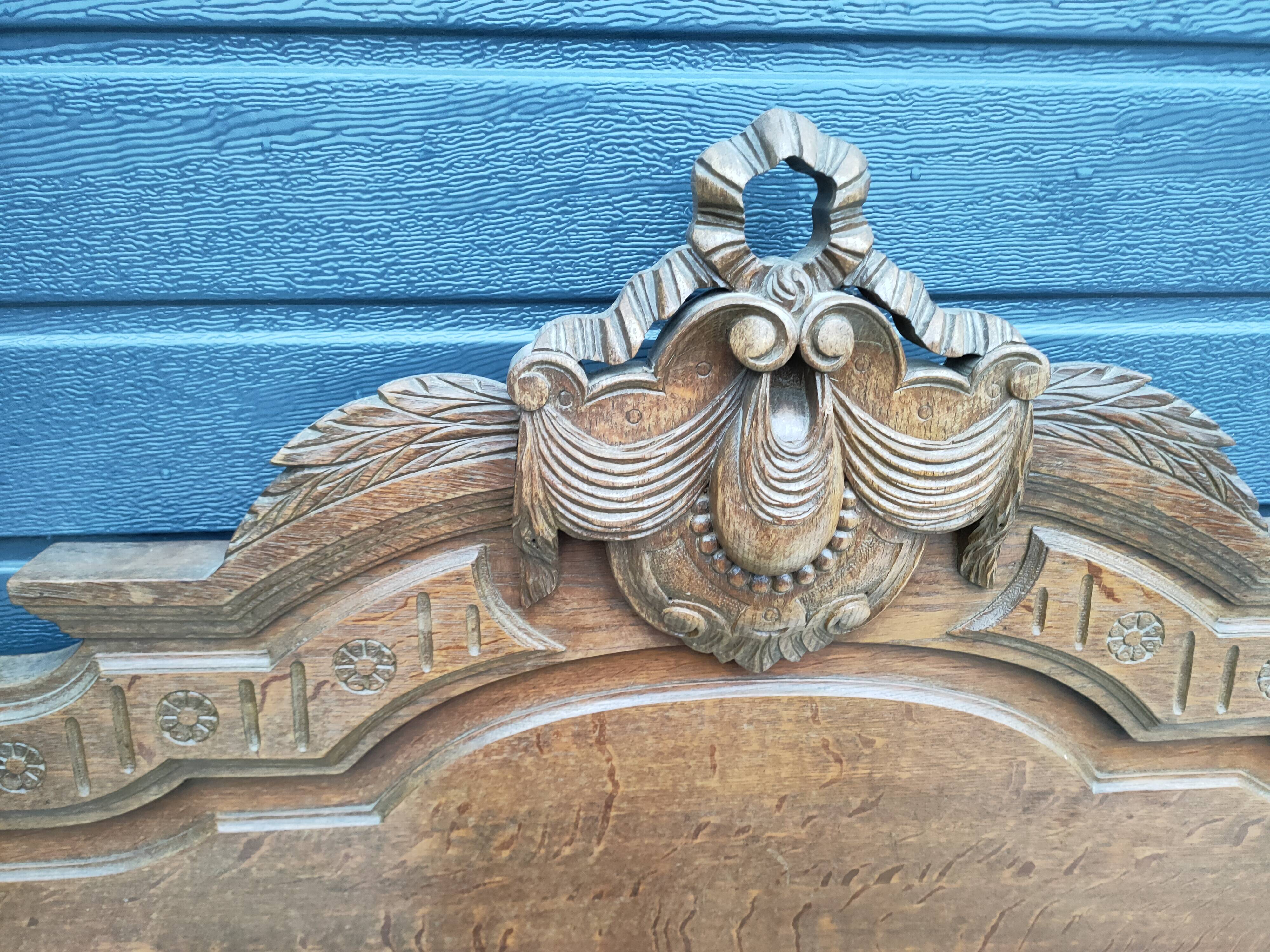 Antique headboard in solid oak