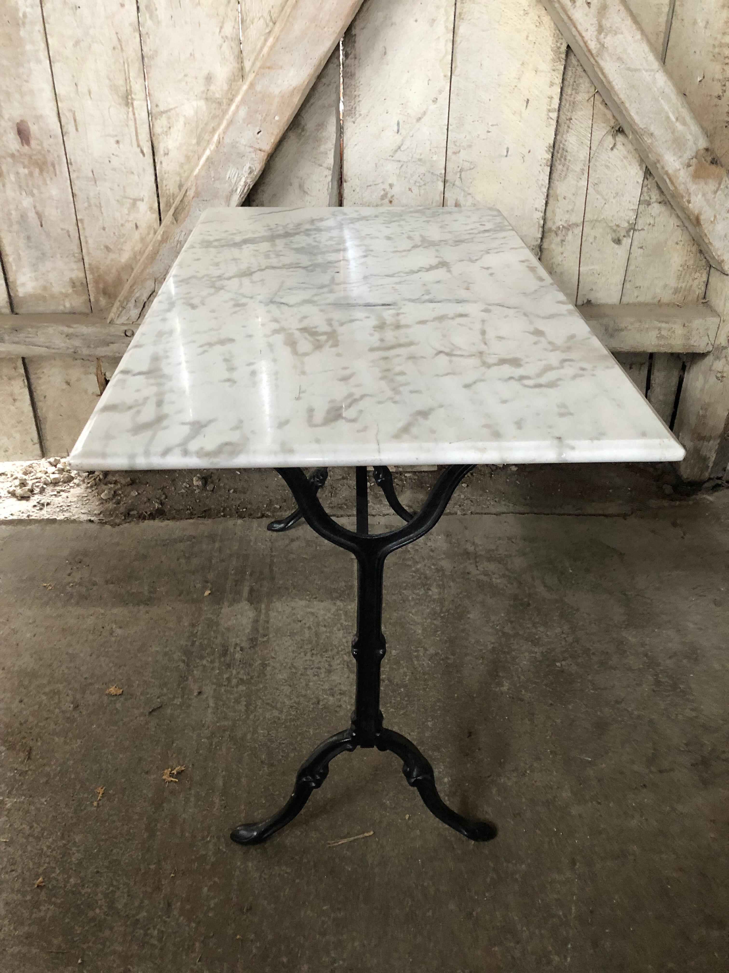 Old bistro table pied fer wrought black + white marble top vintage