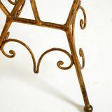 Extraordinary mid-century newspaper and magazine rack with a gilded metal