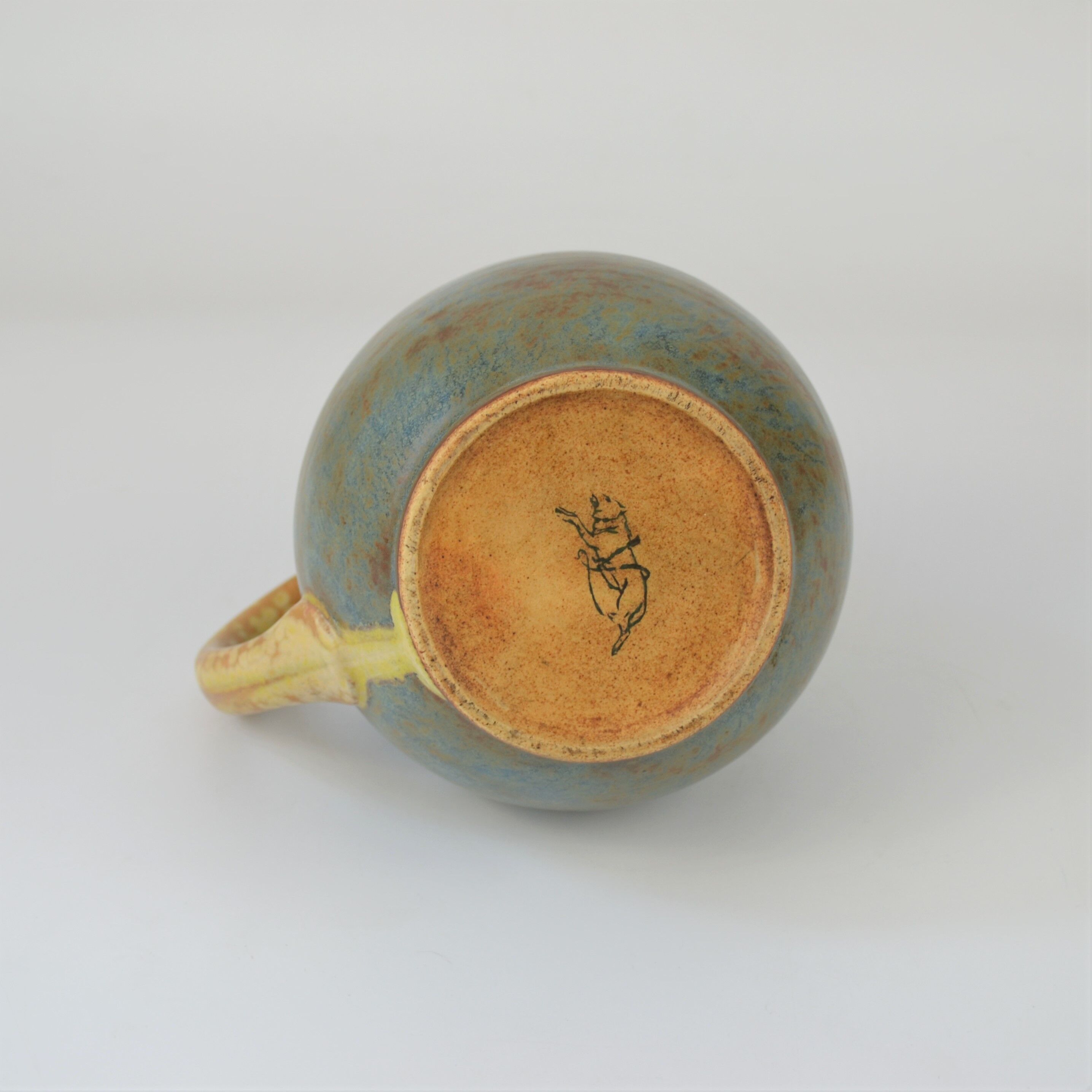 Two-tone pitcher in sandstone by Louis Lourioux