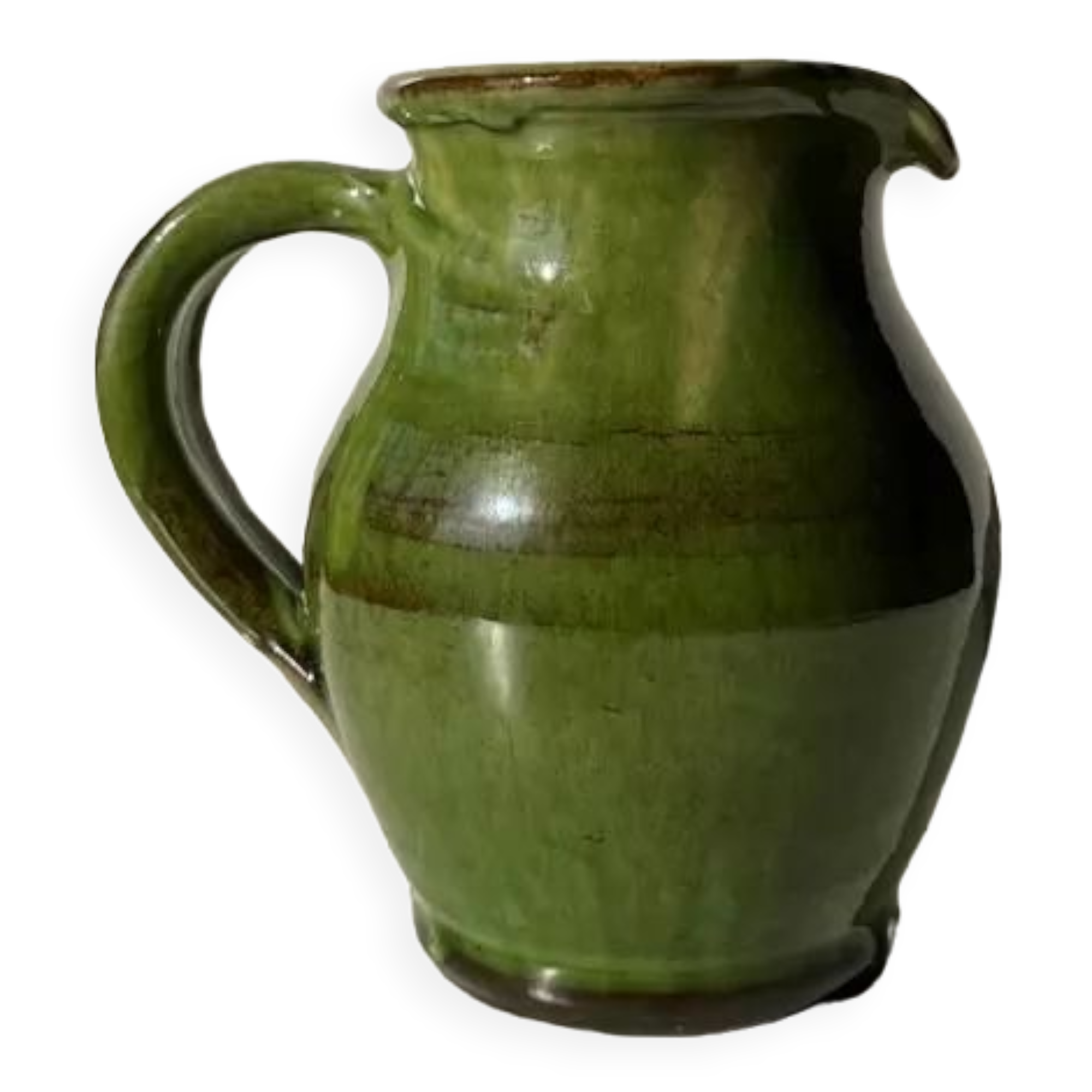 Green glazed ceramic pitcher