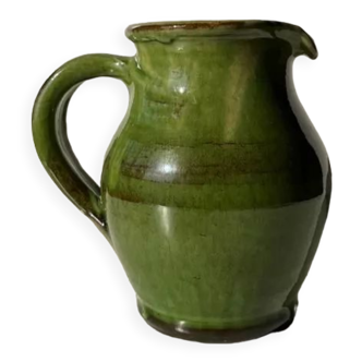 Green glazed ceramic pitcher