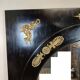 Miroir Empire en bois laqué noir et bronze doré époque XIXeme