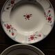 A set of 4 mismatched Art Deco red blue soup plates