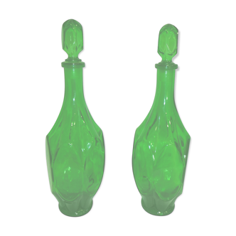 Set of 2 vintage carafes faceted in green glass with caps