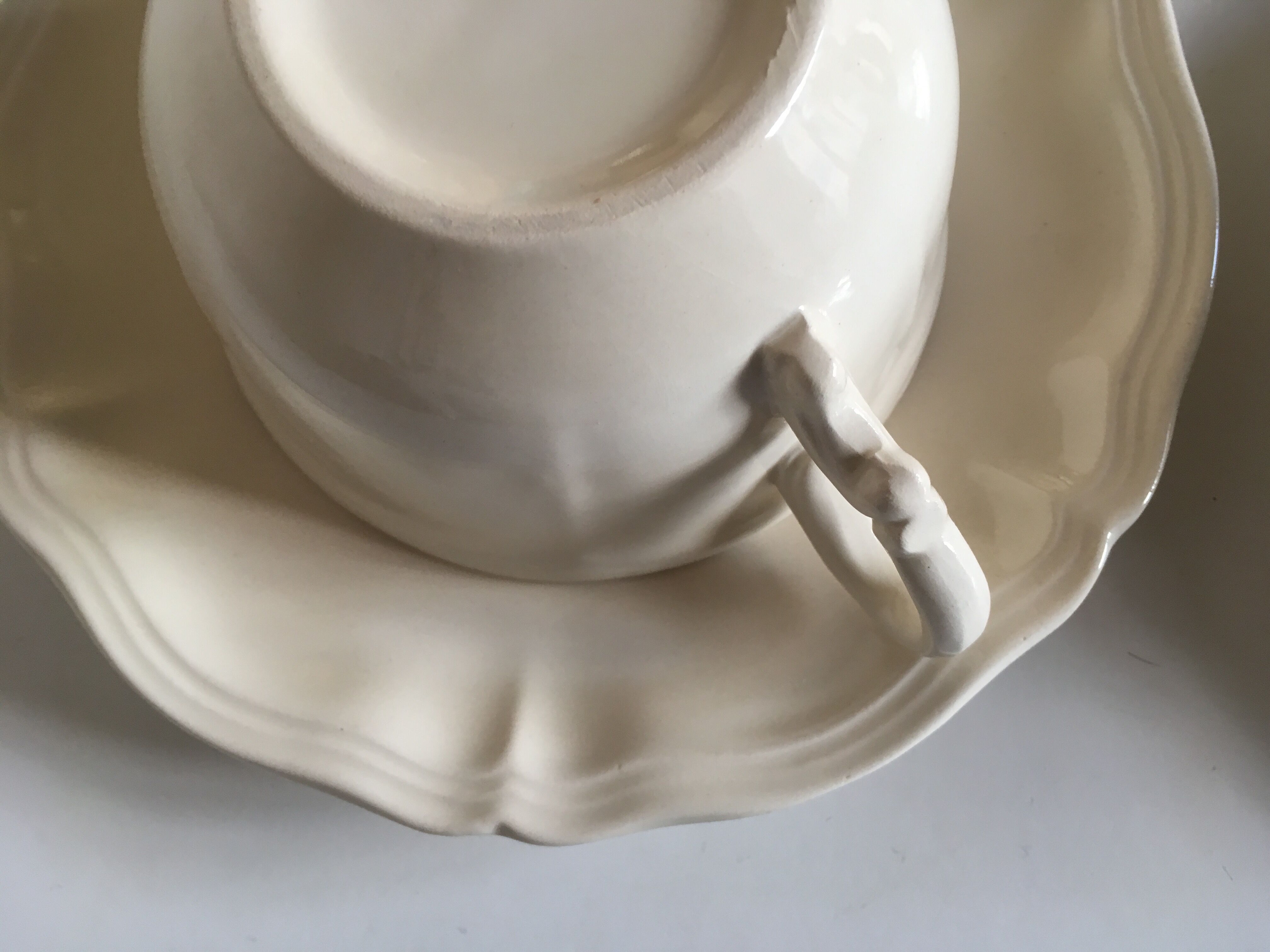 Set of 4 cups breakfasts in faience Sarreguemines ivory to godrons