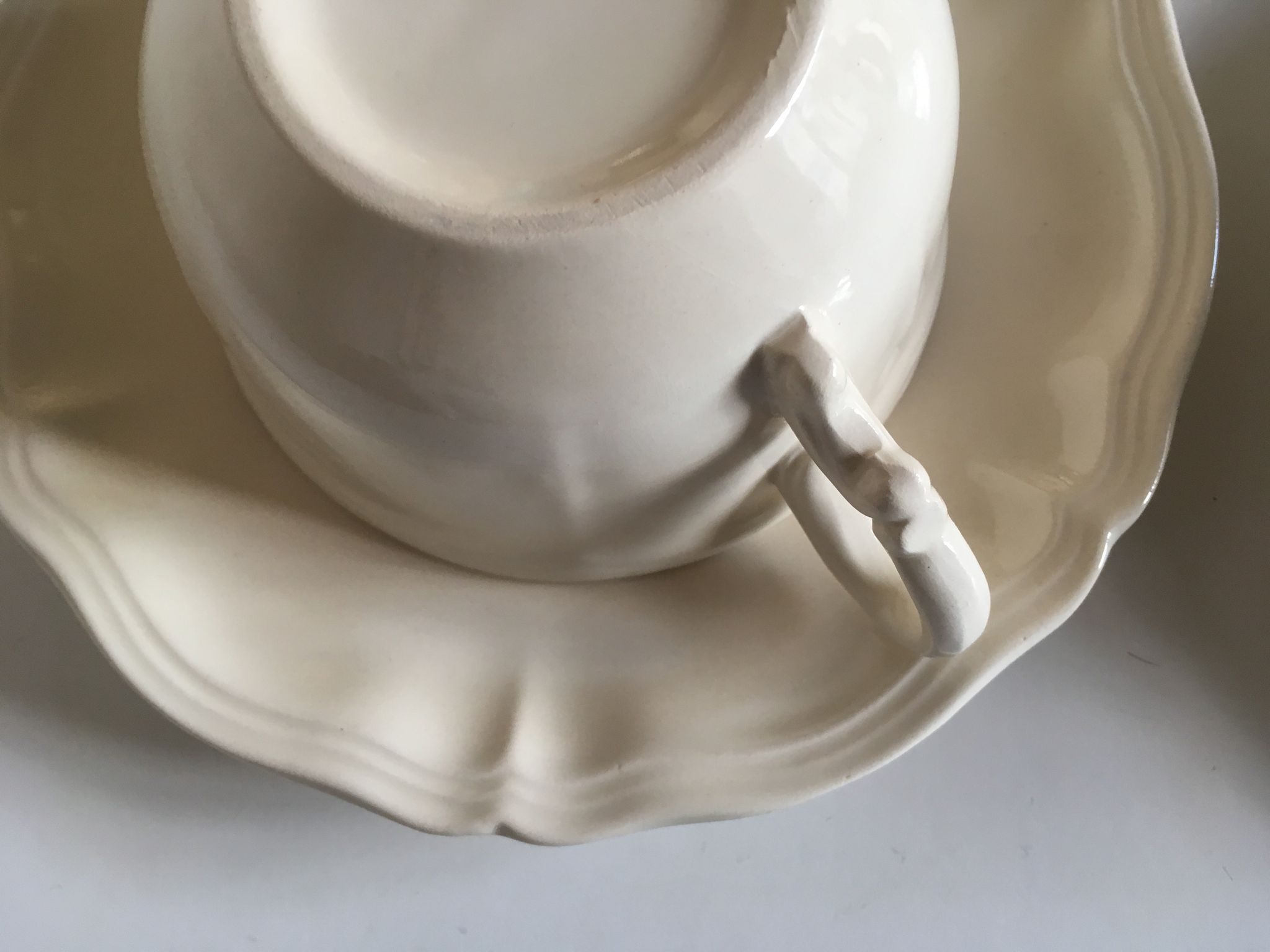 Set of 4 cups breakfasts in faience Sarreguemines ivory to godrons
