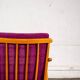 Boomerang armchair in mauve fabric