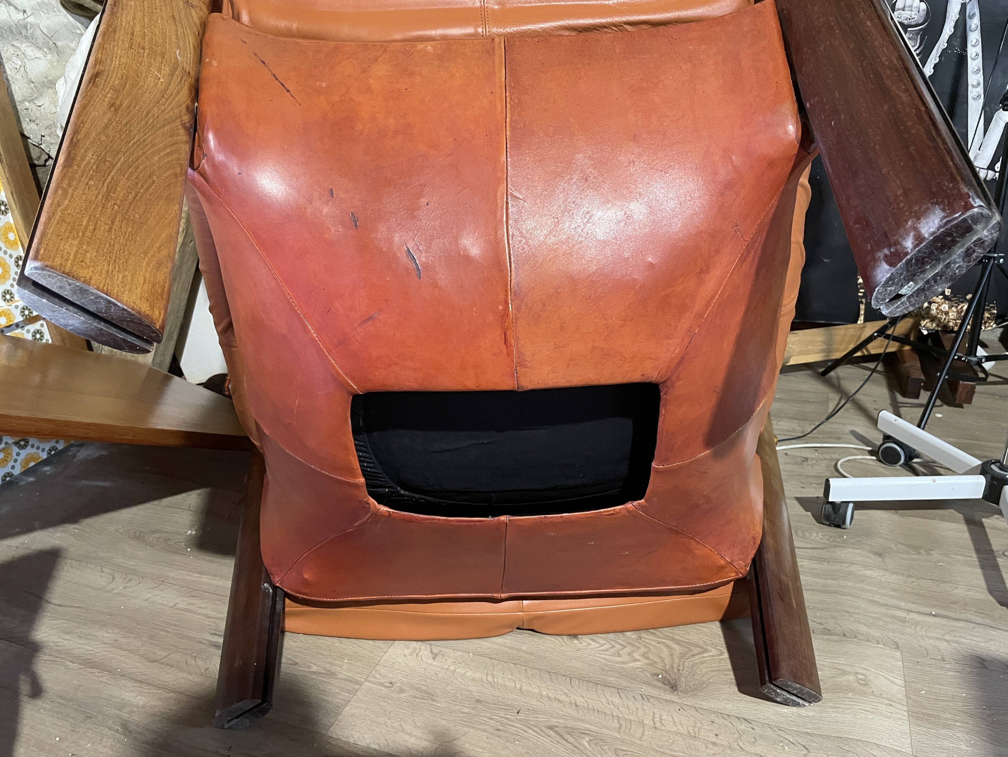 Percival lafer mp-211 sofa set with two armchairs and an ottoman in leather.