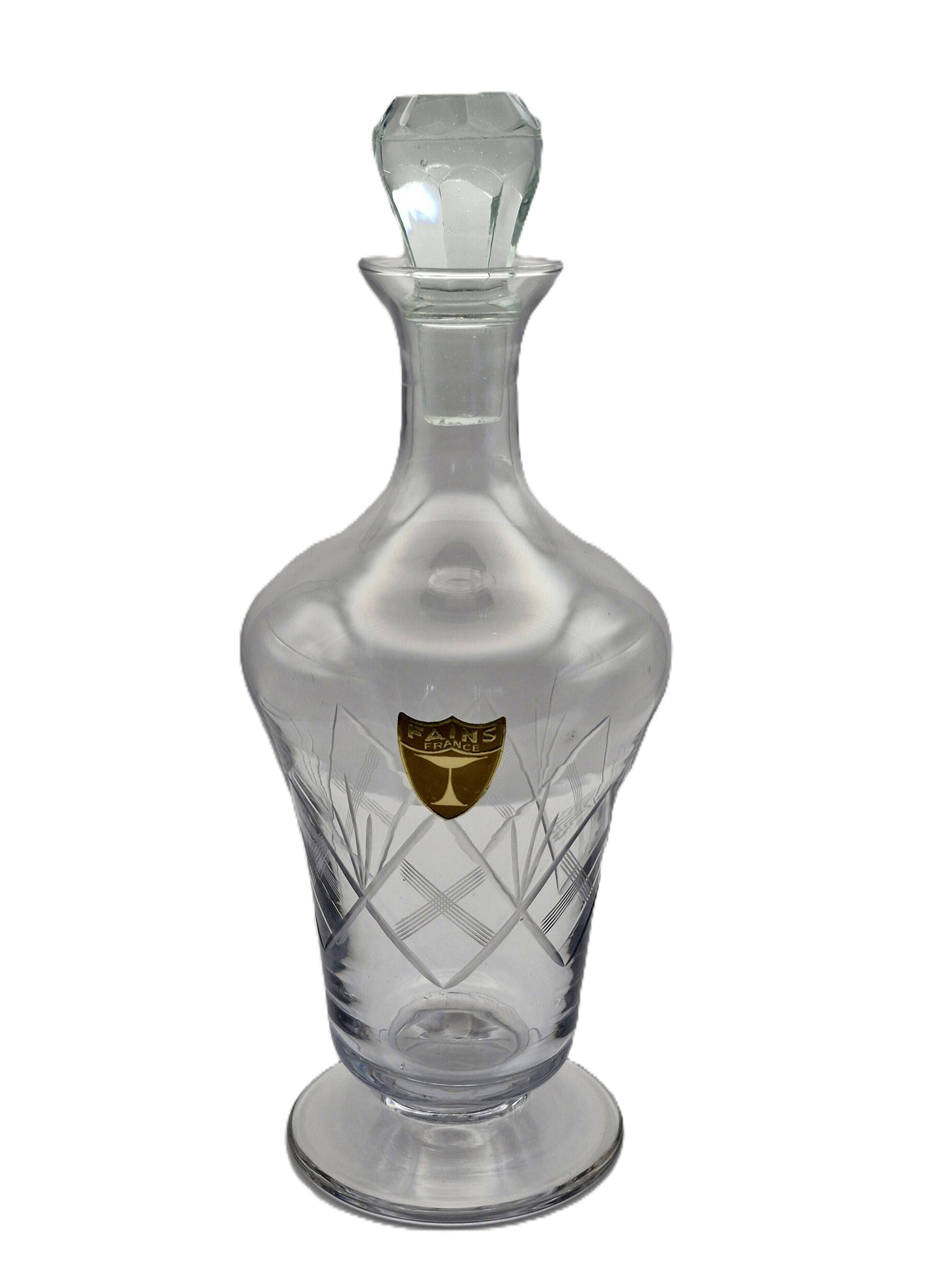Crystal service from Fains, matching wine carafe and water jug.
