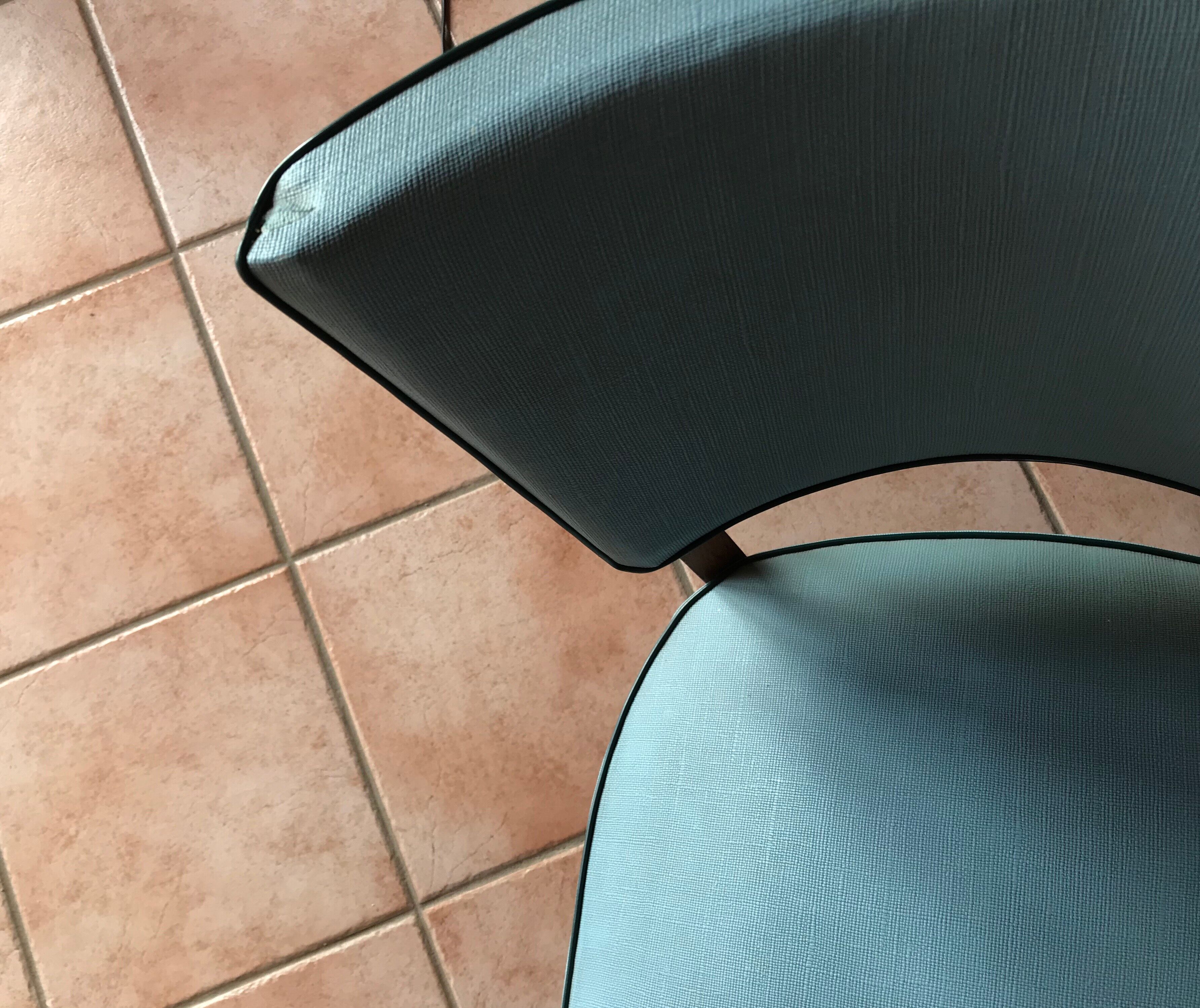 Suite of 4 chairs 50s skai