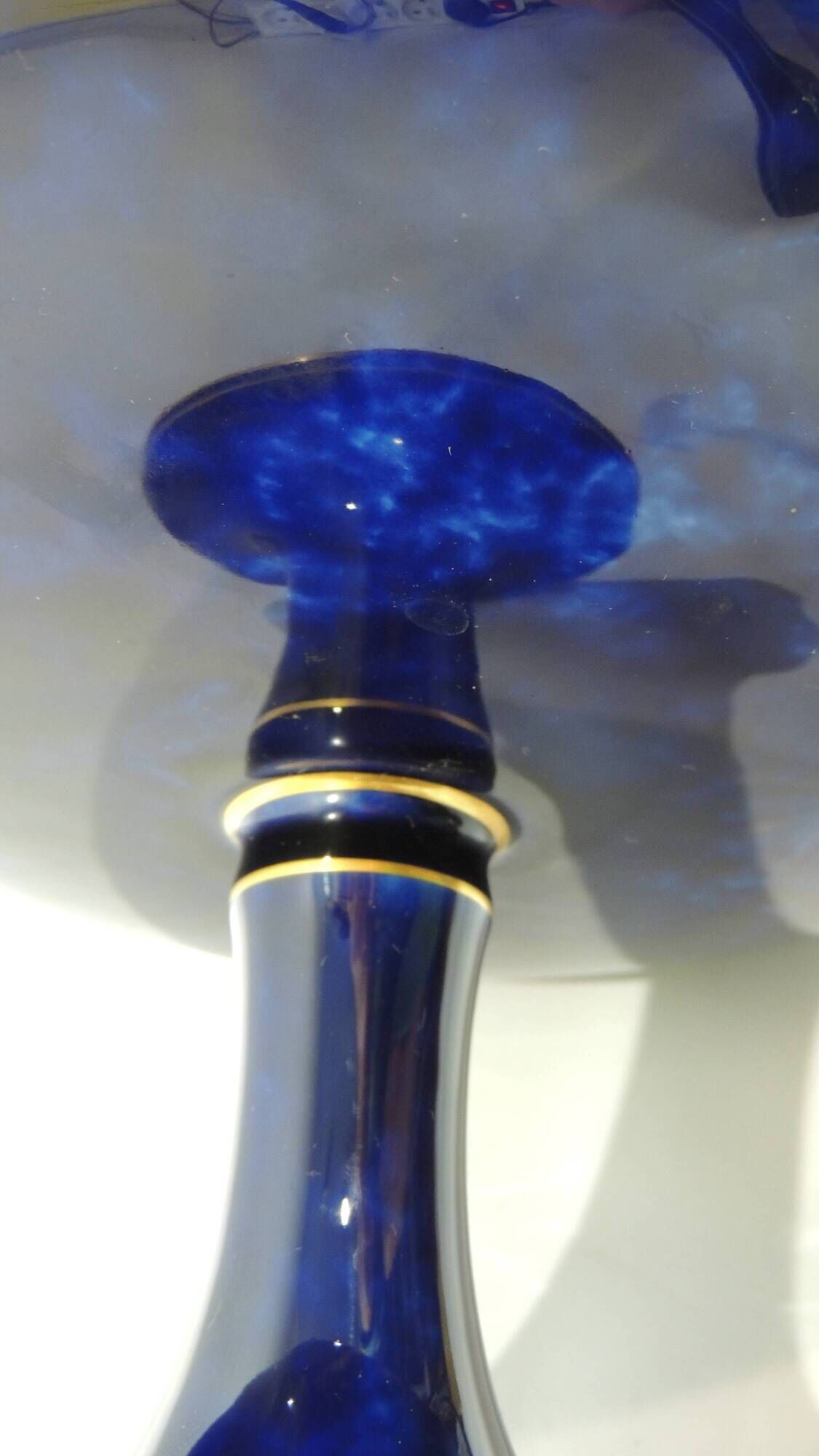 Sèvres porcelain cobalt blue footed bowl with gold rim – center