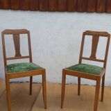 lot of 2 wooden chairs and green velvet