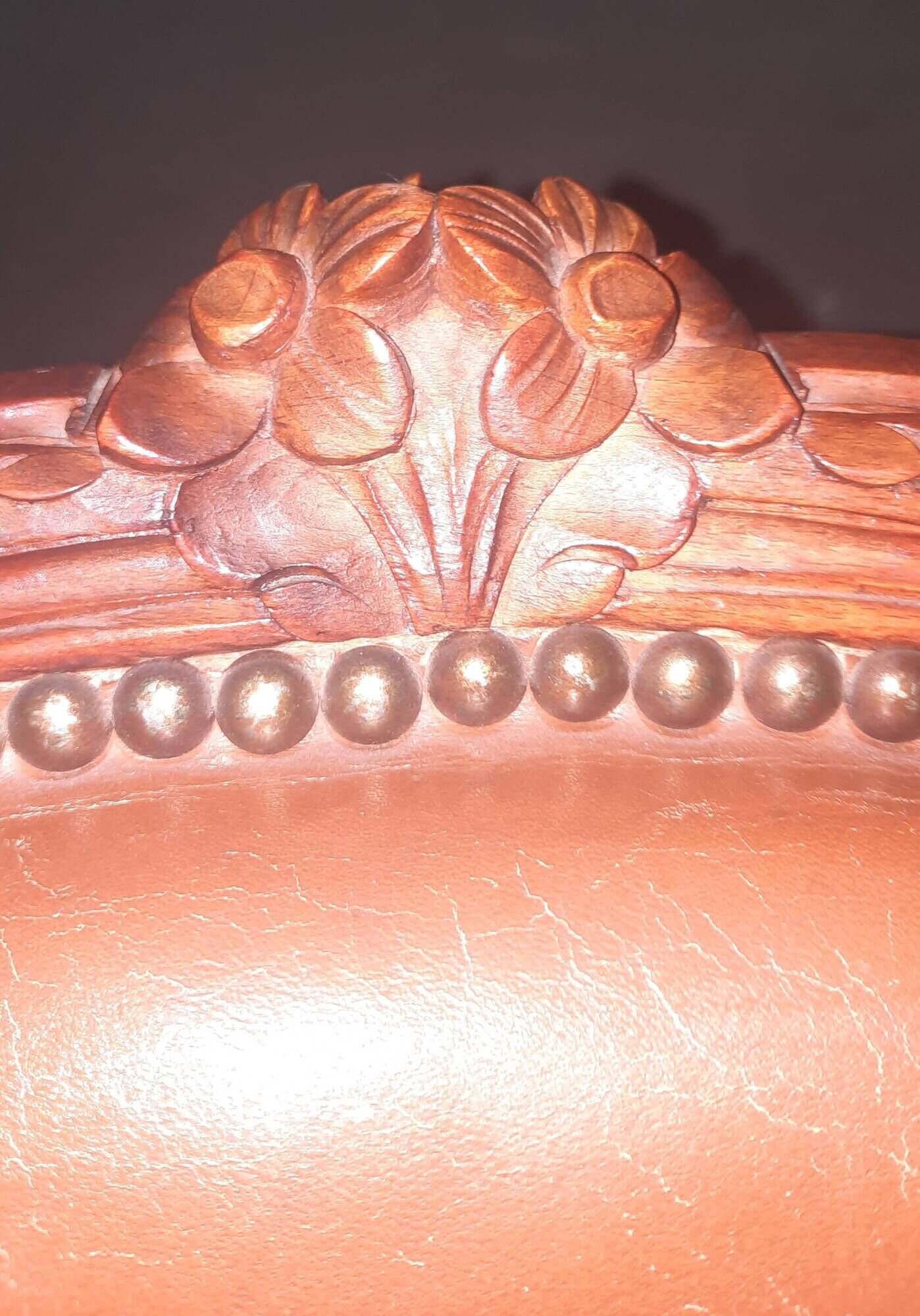 Louis XV style armchair covered in leather.