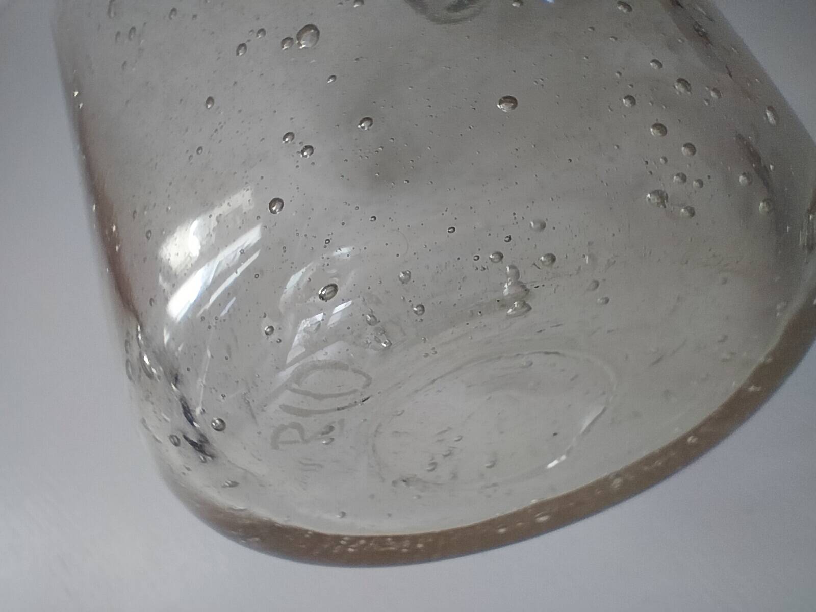 Bubble glass carafe bottle signed Biot in lime green colour.