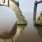 Anton Prinner, pair of Shaman fire dogs in gilded bronze, monogrammed, 1930