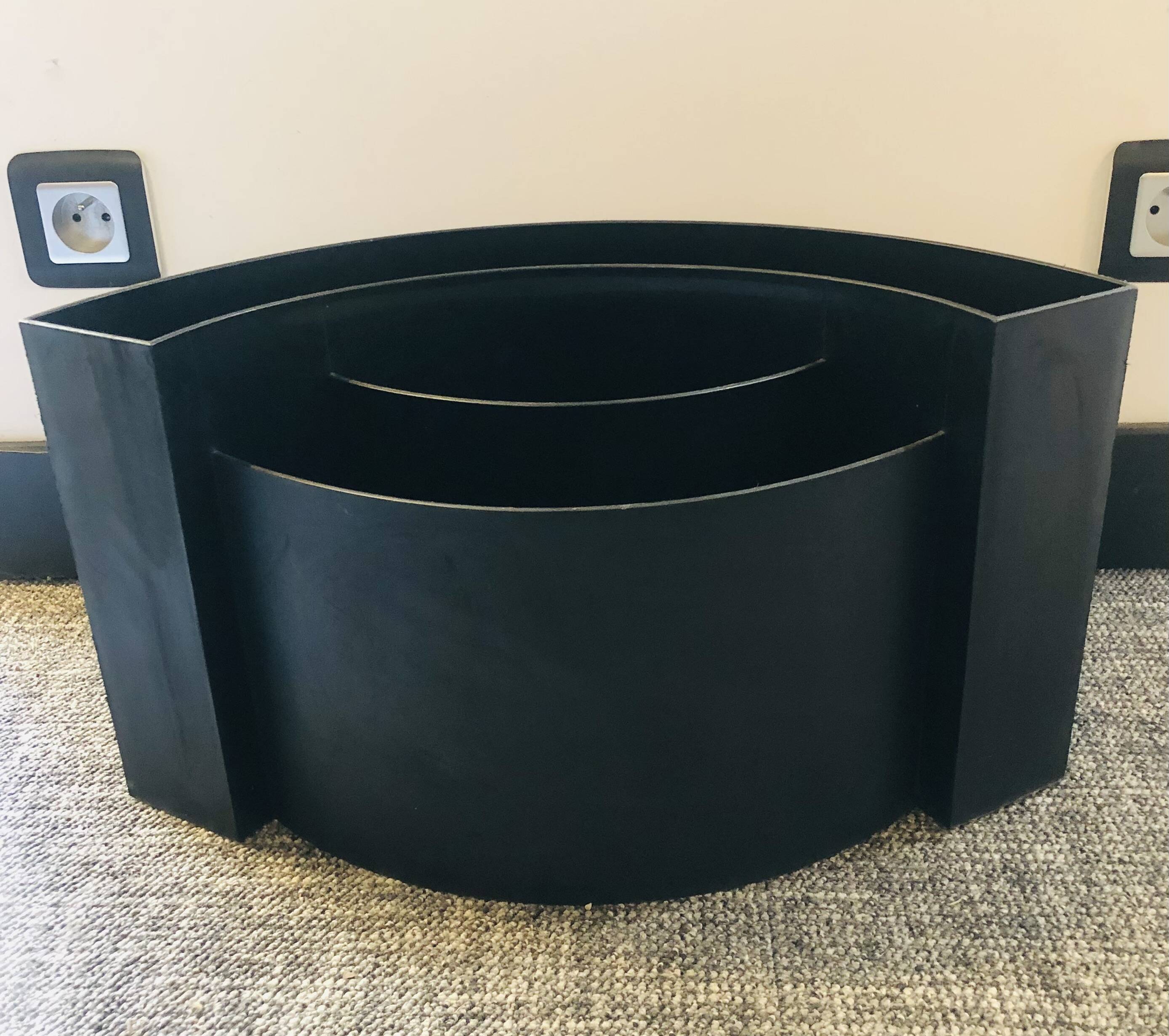 Magnificent black magazine rack.