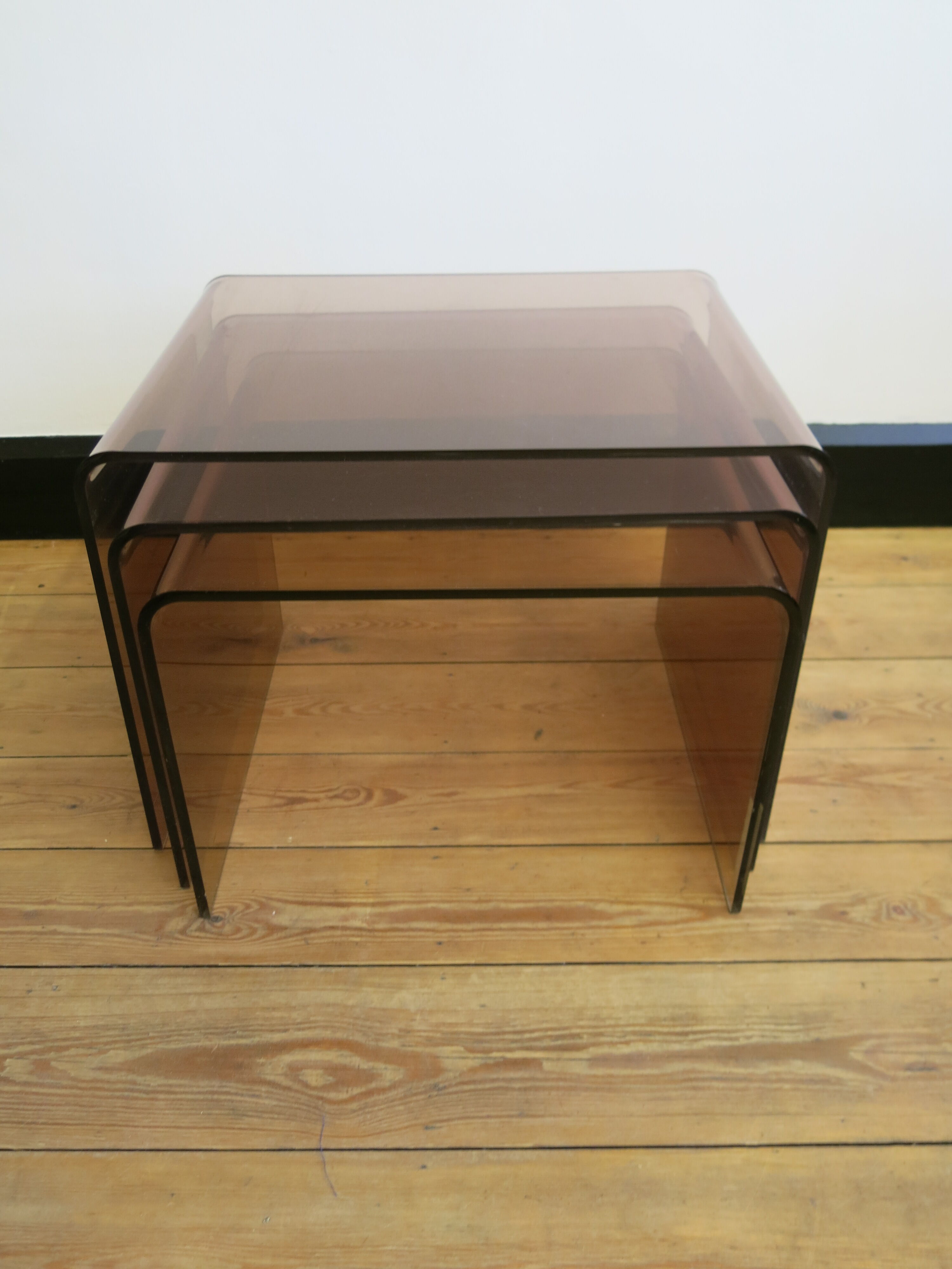 Plexi nesting tables by Michel Dumas