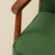 Scandinavian modern chair in green wool, vintage wooden armchair.