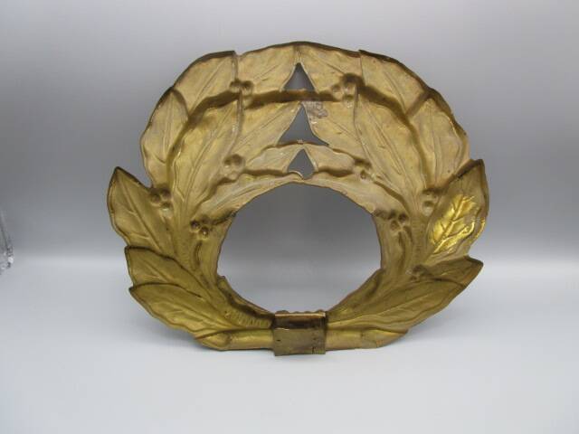 Old ornament in embossed brass - laurel wreath