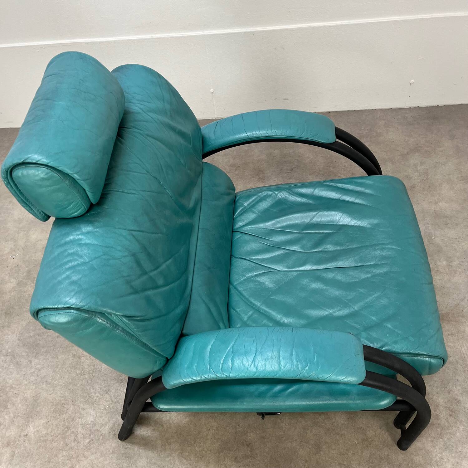 Postmodern design armchair and ottoman, 80s leather