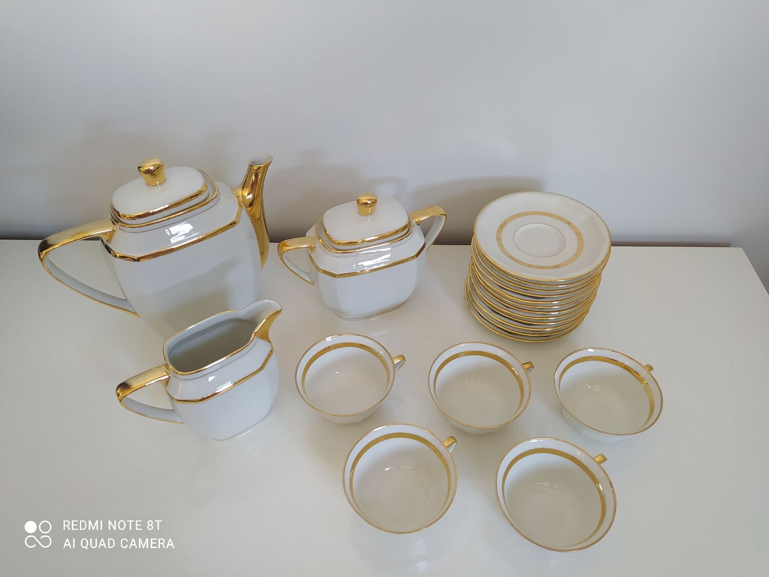 Tea set in white and gold Limoges porcelain
