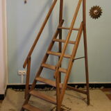 Old wooden stepladder with bodyguards