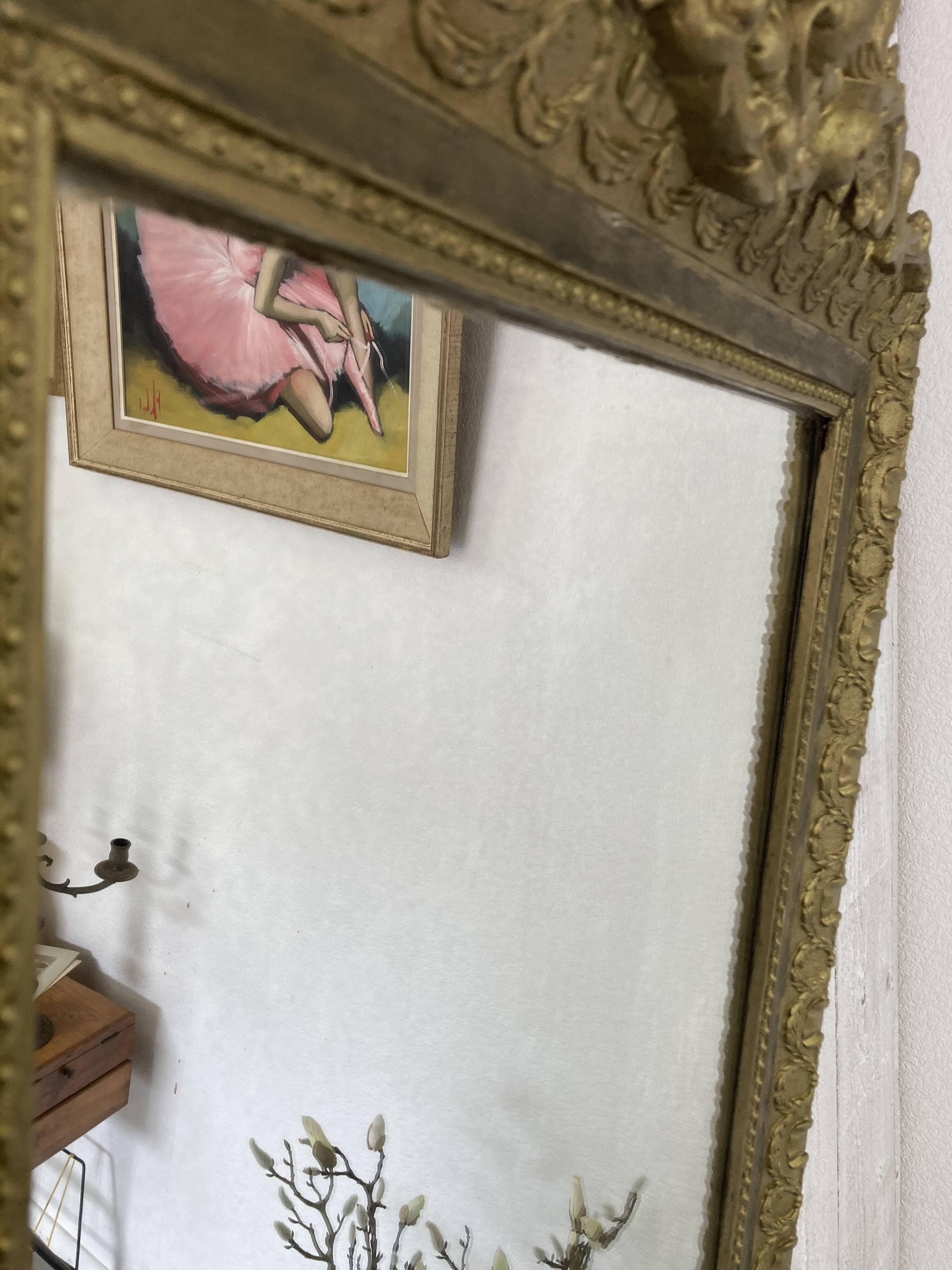 Antique mirror with a pediment