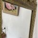 Antique mirror with a pediment