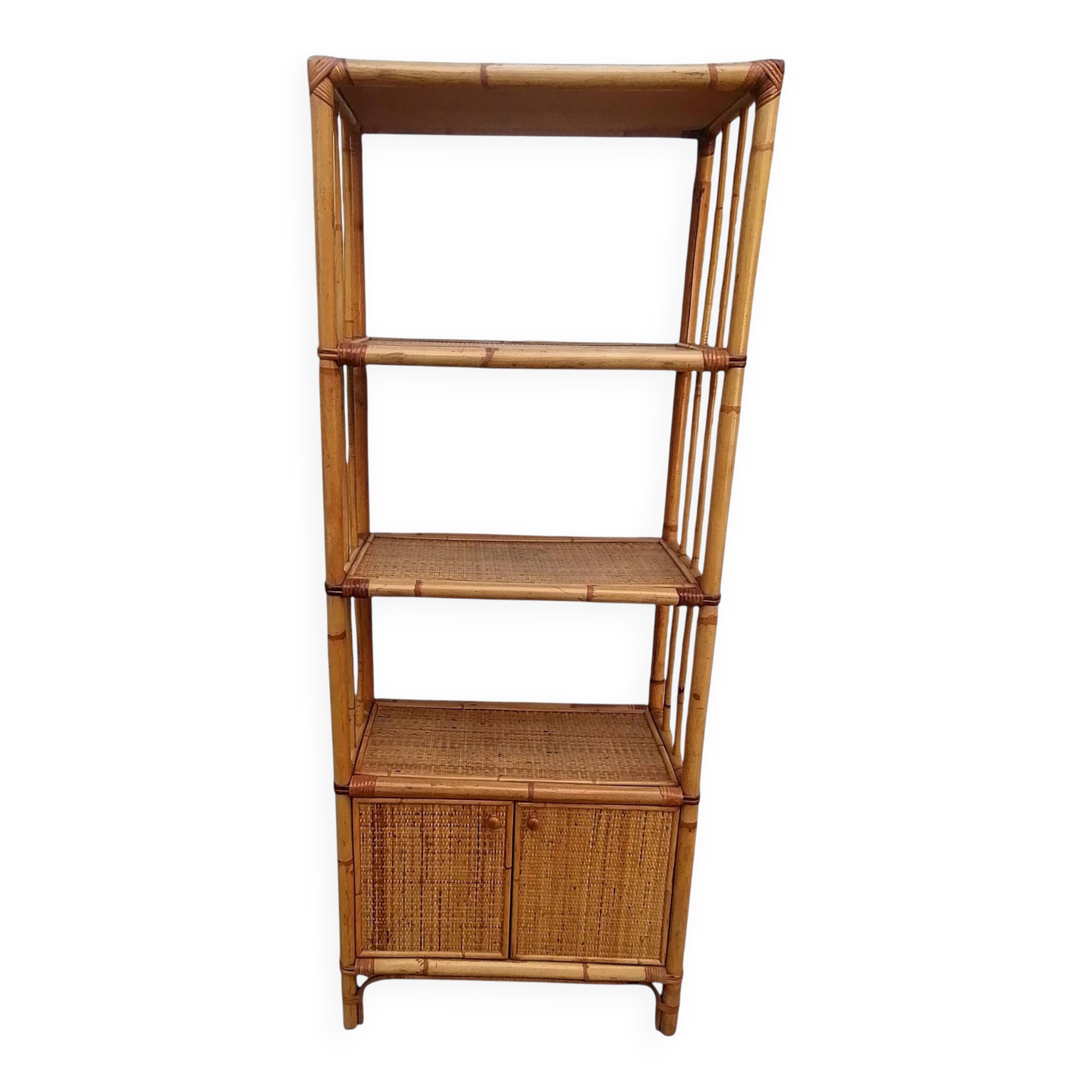 Bamboo and wicker bookshelf, vintage boho-chic from the '70s.