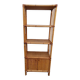 Bamboo and wicker bookshelf, vintage boho-chic from the '70s.