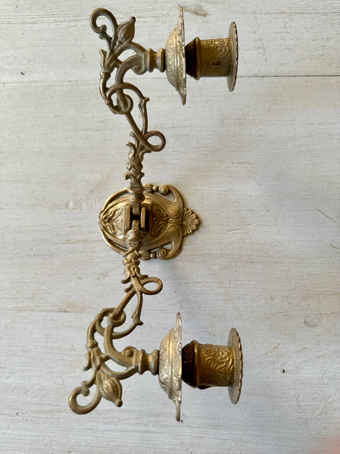 Pair of brass wall candle holders