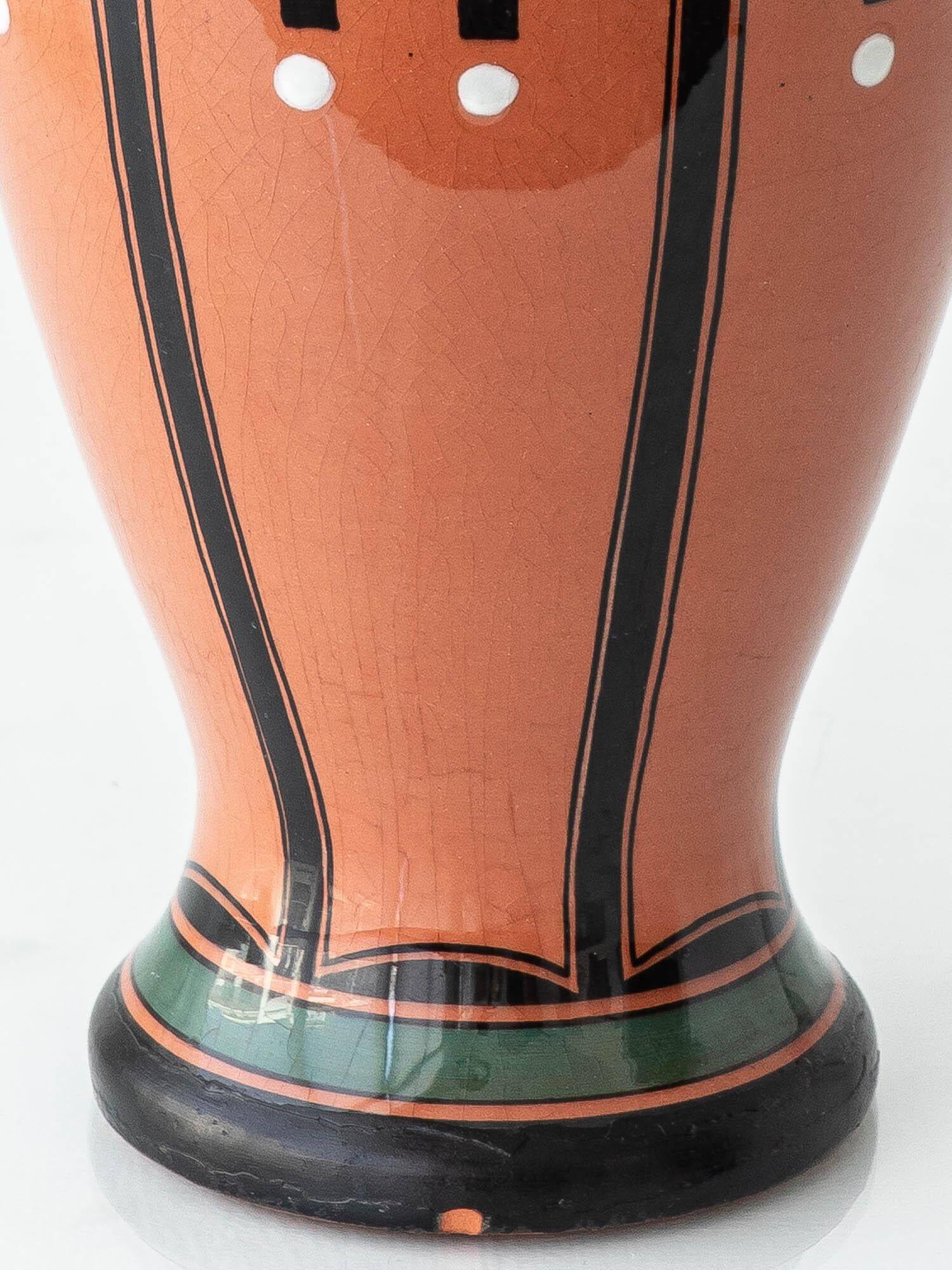 Pair of Dutch Art Deco vases, hand-painted Gouda-style ceramic with bold glazing.