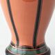 Pair of Dutch Art Deco vases, hand-painted Gouda-style ceramic with bold glazing.