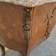 Commode style Louis XV en marqueterie et bois de rose