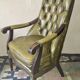 Olive green tufted leather library armchair, 1970s
