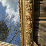Miroir en bois et stuc doré