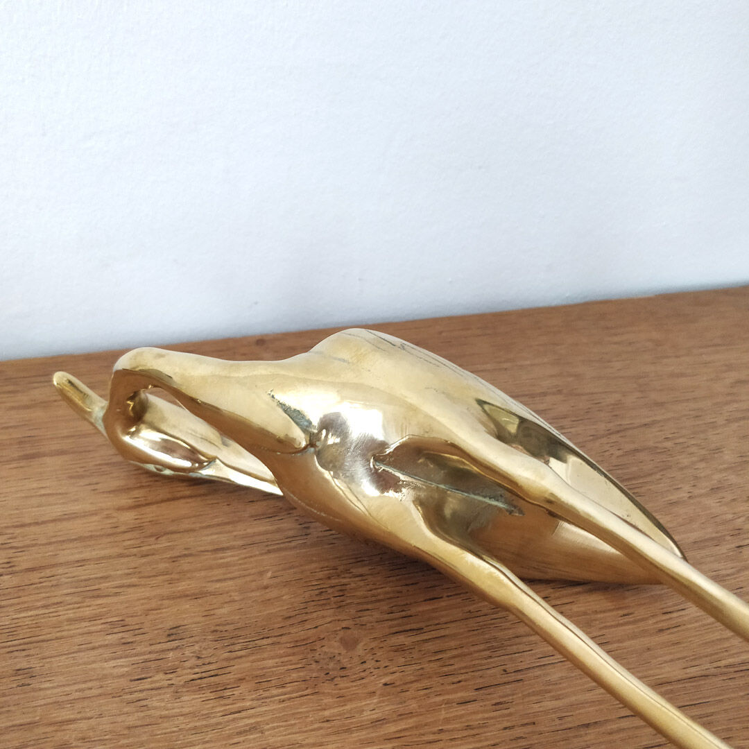 Couple large herons in polished golden brass