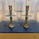 Pair of important brass candle holders