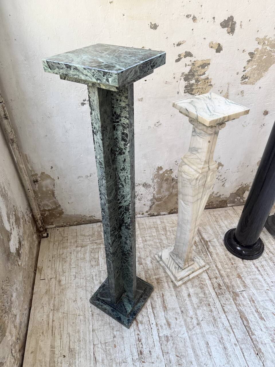 Set of 4 marble columns or pedestals.
