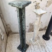 Set of 4 marble columns or pedestals.