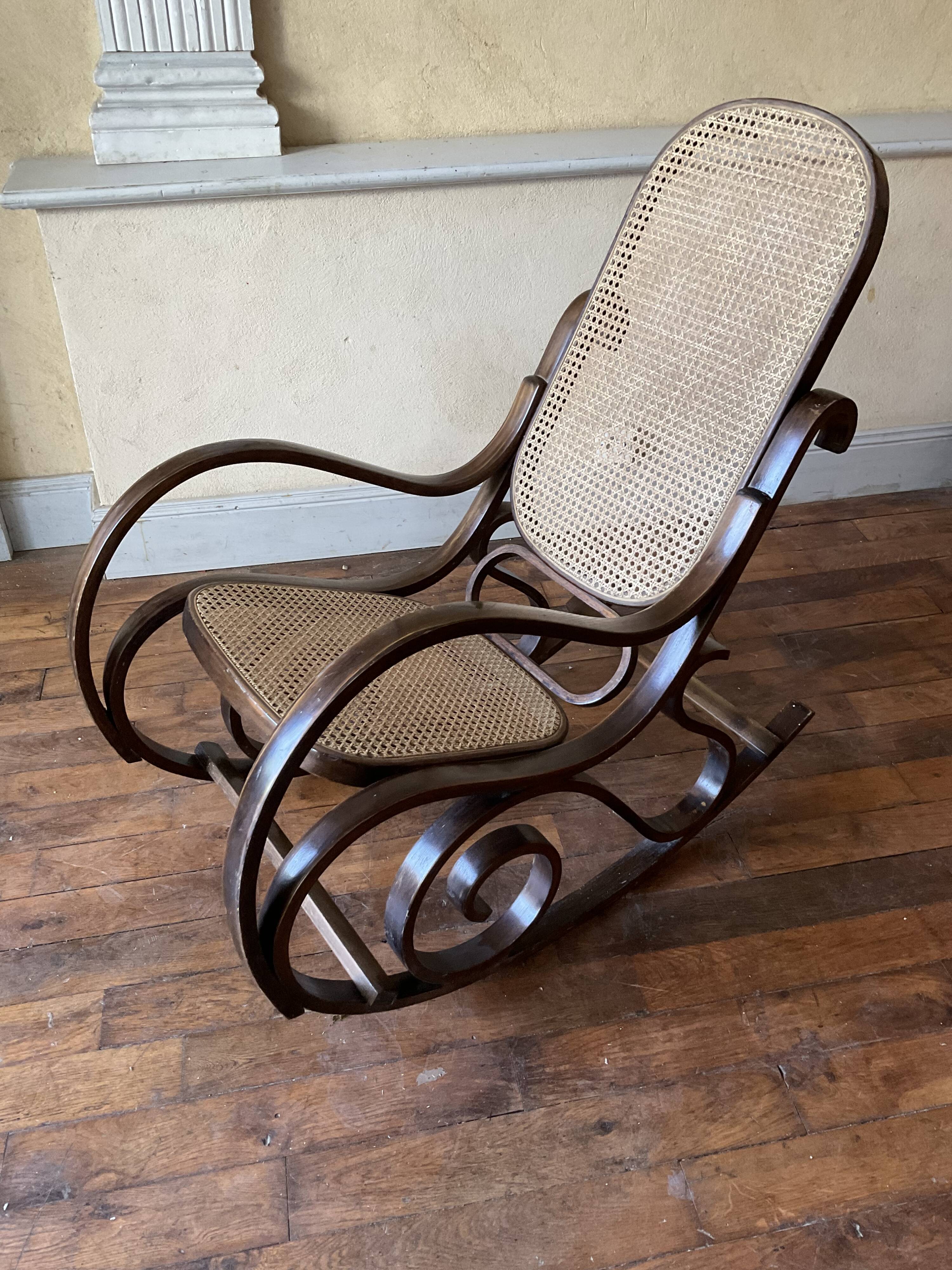 Vintage rocking chair in curved wood